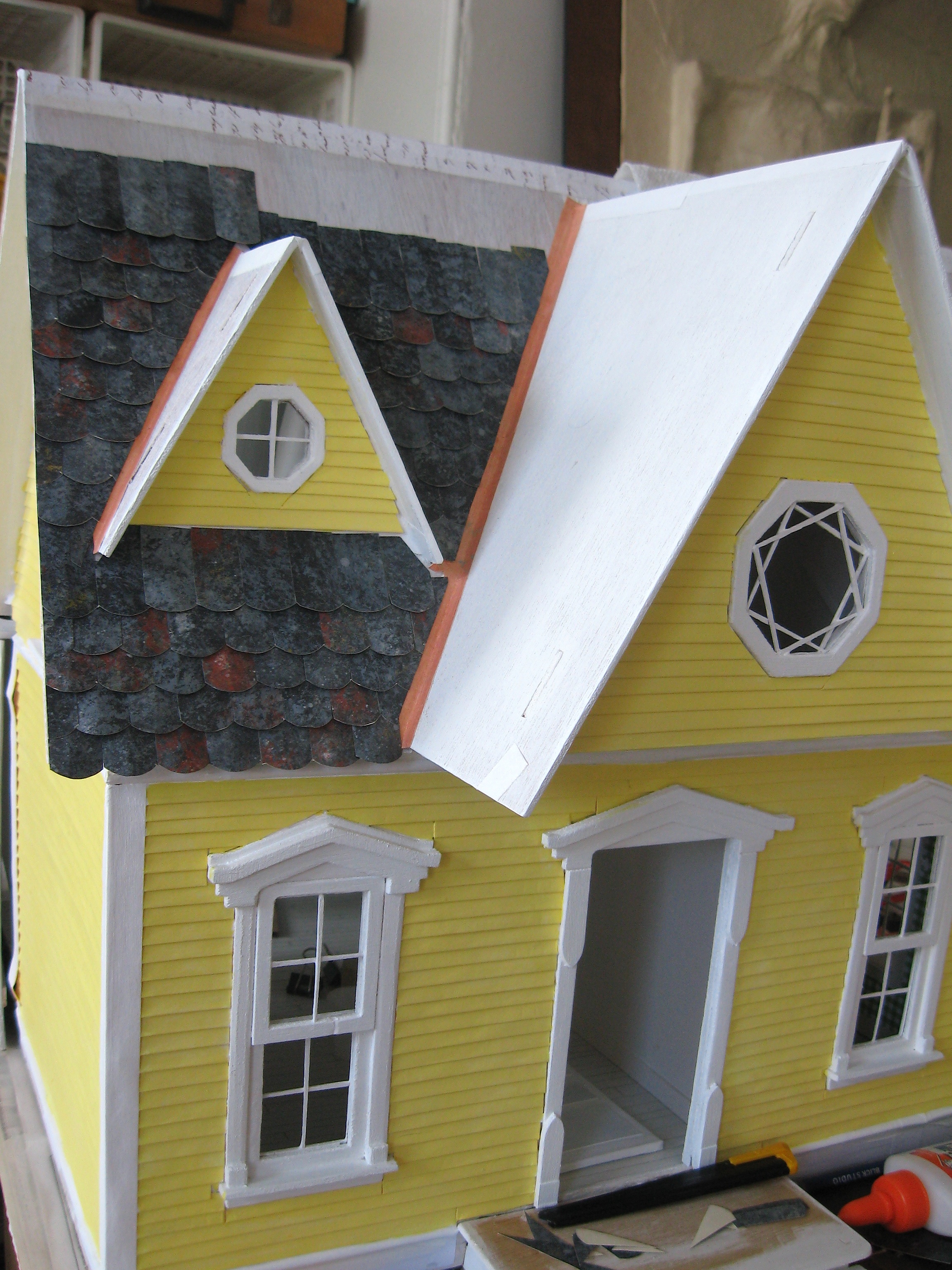 Slate roof tiles in progress.