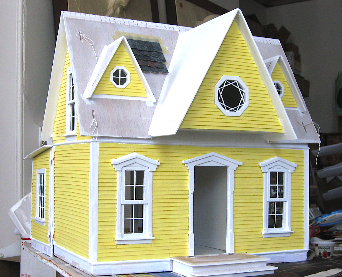 Yellow dollhouse, in progress, front.